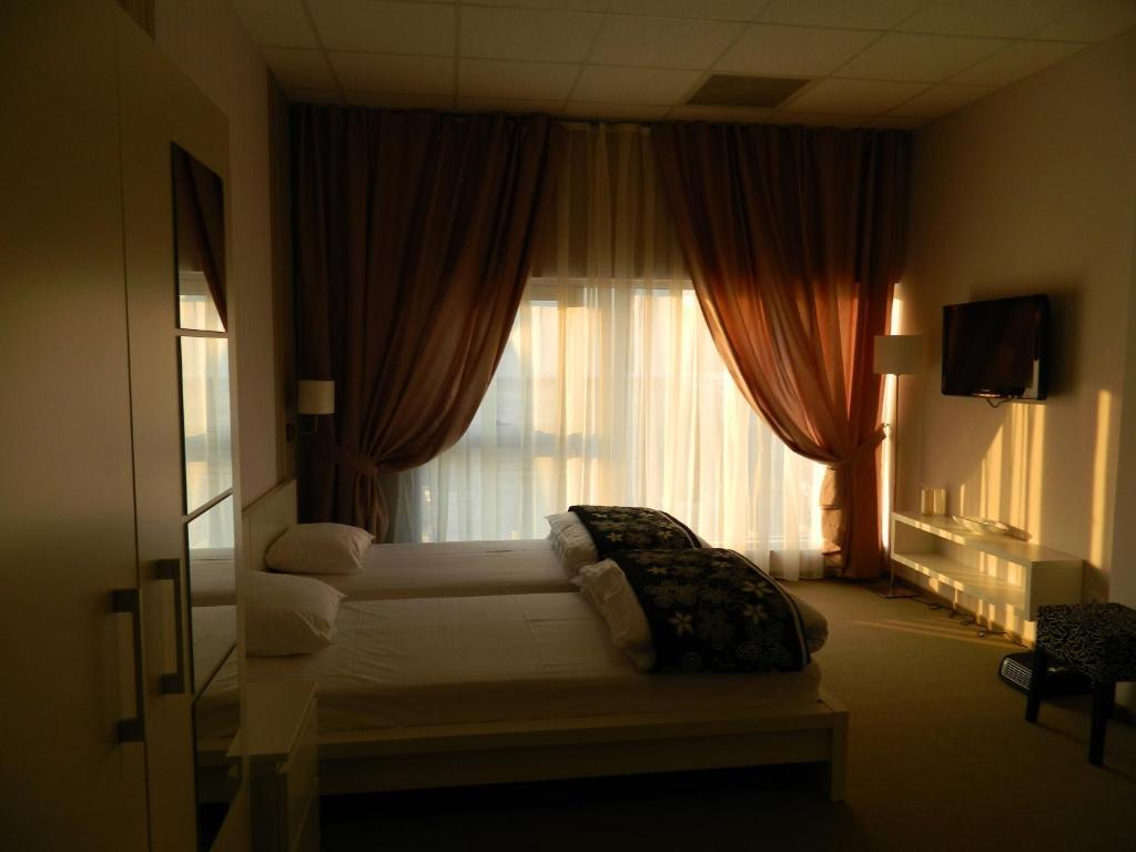 Guesthouse City Central International Escópia Quarto foto